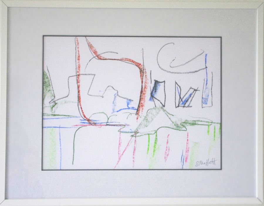 A framed abstract drawing.